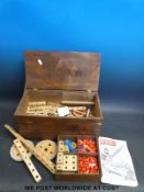 A wooden box of Bilofax building toys