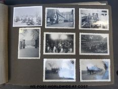 An album of German WWII photographs detailing troop life in Hanover and Berlin including