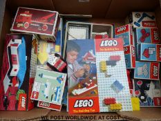 A collection of Lego vehicles, buildings and accessories,