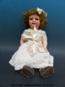 Heubach Koppelsdorf bisque headed doll with weighted brown eyes, open mouth,