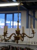 A gilt metal four branch chandelier