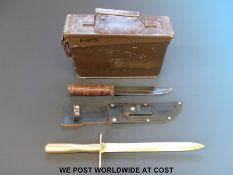 Two knives and an ammunition tin