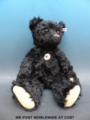 Steiff black mohair 1912 replica bear with jointed limbs and growler, 50cm tall,