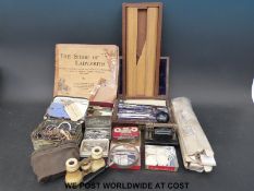A collection of drawing instruments, stationery items, cased opera glasses, magnifier,