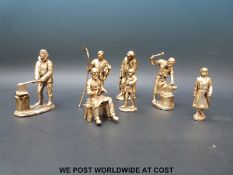 Seven brass figures of craftsmen (height of largest 10cm)