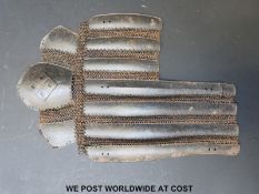 A Japanese Edo period Kote or arm protector with family crest on elbow.