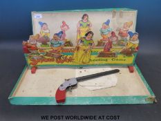 Chad Valley Snow White elastic band gun shooting gallery game,