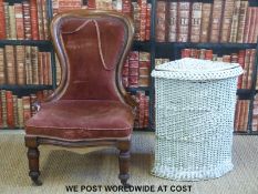 A Victorian nursing chair and Lloyd Loom basket