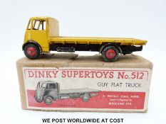 Dinky Supertoys diecast model Guy 4-Ton Flat Truck, 512, with yellow cab and flatbed,