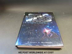 Star Wars Encyclopedia signed by twelve of the cast including Dave Prowse, Jeremy Bullock,