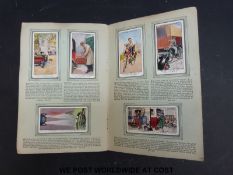 A collection of cigarette card albums including Godfrey Phillips aircraft, John Player aircraft,