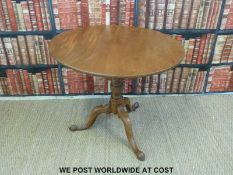 A 19thC mahogany circular single plank tilt top table (diameter 86,