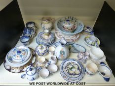 A collection of salt-glazed items to include plates, egg cups, bowls and cups,