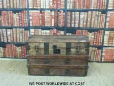 A 19thC metal and ash bound domed trunk with carrying handles (W85 D50 H57cm)