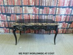 A continental lacquer style desk with three drawers (W150 D75 H79)
