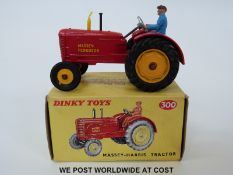 Dinky Toys diecast model Massey-Harris Tractor, 300, with red body,