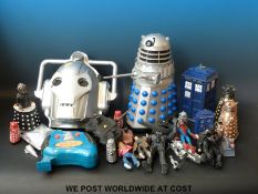 A large collection of figures mainly relating to Dr Who including remote control Daleks,