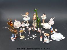 A quantity of Dresden and similar figurines, glass animals,