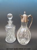 A silver plated and cut glass claret jug and a cut glass decanter of waisted form
