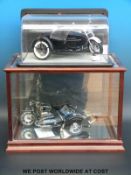 Two Franklin Mint diecast model motorbikes and sidecars,