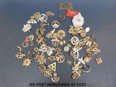 A collection of military badges including Argyll and Sutherland, Leicestershire,