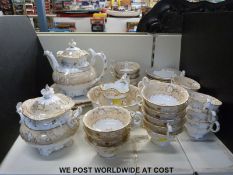 A 19thC tea set in the Rockingham style including large teapot,