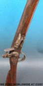 Brown Bess flintlock hammer action rifle with brass trigger guards and mounts,