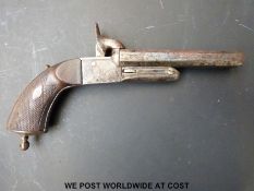 Double barrelled side by side pinfire hammer action pistol with carved grip, engraved locks,
