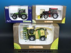 Three Universal Hobbies diecast model tractors, two Country Collection and one Deutz Fahr,