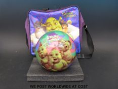 An un-drilled Brunswick Swamp Buddies bowling ball and bag