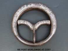 A Japanese Edo period hand forged and silver inlaid horses girth buckle.