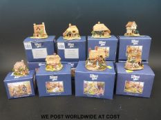 Twelve blue boxed Lilliput Lane houses to include Borrowdale School, Applejack Cottage,