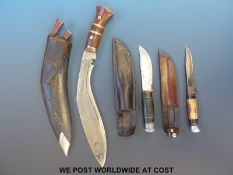 A kukri and two other knives