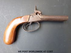 Double barrelled side by side percussion hammer action pocket pistol with shaped grip and 3inch