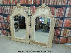 A pair of oak or similar framed mirrors (height overall 137cm)