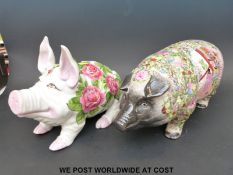 Four large collectable pigs,