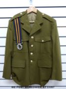 A Number 2 dress jacket for The Royal Electrical and Mechanical Engineers,