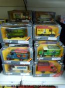 Thirty-one Corgi Classics diecast model buses, coaches and delivery lorries,
