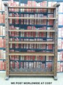 An oak cheese press or bookcase shelf unit with wine rack to base (H180 x W125 x D30cm)