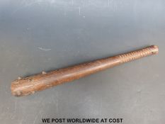 A WWI hardwood trench club with hobnail spikes,
