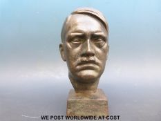 A cast metal sculpture of Hitler,