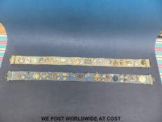 Two military trophy belts of cap and other badges including British Army and Royal Air Force