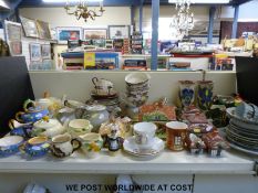 A quantity of decorative earthenware pottery including Watcombe, hand decorated Italian ceramics,