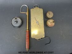 A quantity of vintage fishing items to include two brass fishing reels, together with another by J.