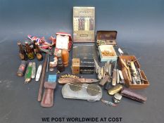 A group of various collectables and curios to include pen knives, propelling pencils, whistles,