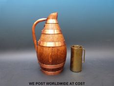 A coopered ewer and a military brass belt mounted flag rest