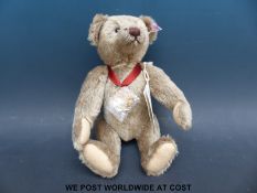 Steiff brown mohair bear made for Danbury Mint 2013 with jointed limbs and medallion, 30cm tall,
