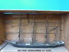 A scratch built model of the Archibald Russell tall ship and two sets of plans (one for the model,