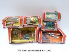 Six Britains LH model farm implements comprising Forage Harvester 9542, Ploughs 9546,