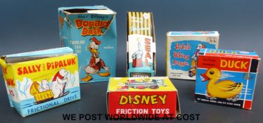 Six Disney and similar friction toys comprising Marx Donald Duck, OK Performing Seal,